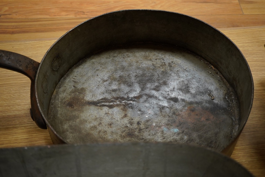 A large 19th century copper pan and fish kettle, largest 73cm in length